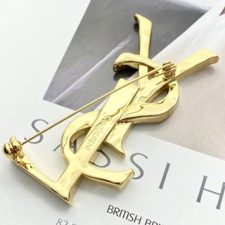 YSL Sculpted Gold Monogram Pin Brooch